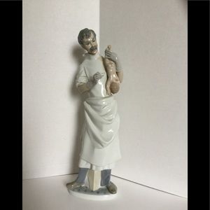 Lladro “Obstetrician” Doctor with Baby #4763